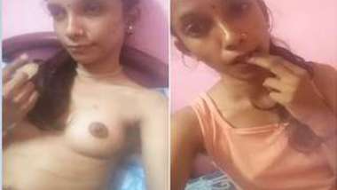 Dollface from India uncovers her thin XXX body and sucks fingers