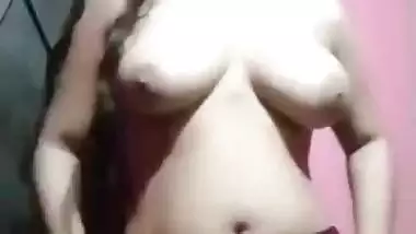 Beautiful cute girl showing her big boobs