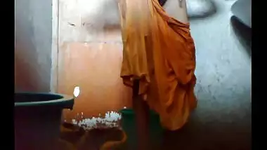 Bangladeshi Maid taking shower.