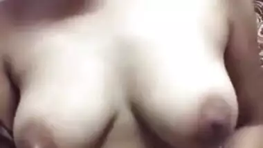 Slinky young Desi woman takes sex bra down and flaunts her XXX boobs