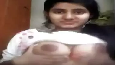cute girl fondles boobs on webcam