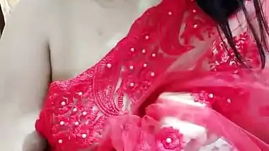 Sexy Bhabhi in See through Red Saree without blouse Exposing Boobs