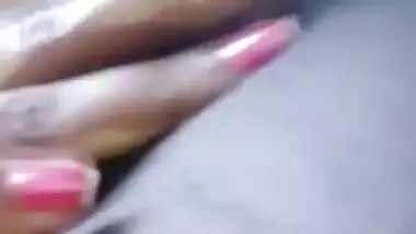 Beautiful horny Indian Bhabhi fingering her cunt