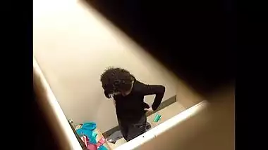 Young college girl chaging in dressing room in mall caught voyuer