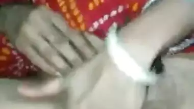 Solo porn clip with Indian girl who touches medium tits and snatch