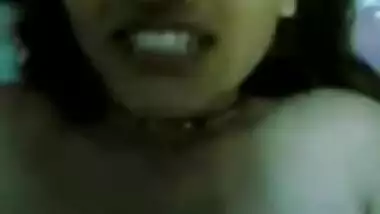 Shy girl enjoying boobs sucking by her boyfriend