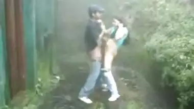 Indian girl sucking and fucking outdoors in rain