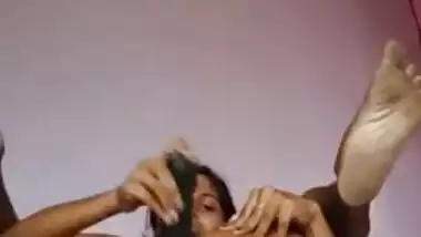 Desi girl stripping and masturbating with a big black dildo