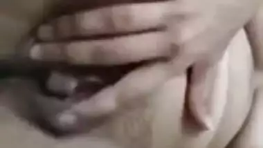 Horny girl fingering herself