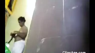 Tamil maid changing dress in her room captured using hidden cam