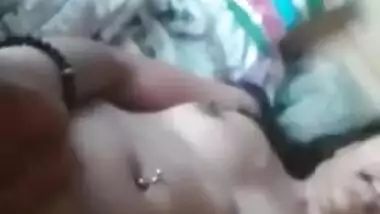 Indian babe with wonderful hair sucks fingers and rubs XXX slit