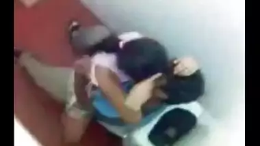 Hidden cam fuck by desi lovers in college bathroom