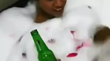 Attractive Desi chick enjoys beer and bubble bath in hot XXX video