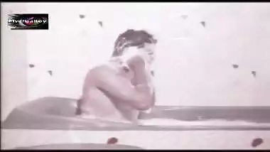 mallu indian seducing a boy in soap lathered tub