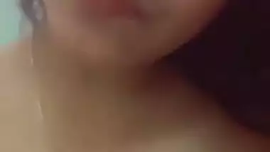 Horny girlfriend playing with her big boobs