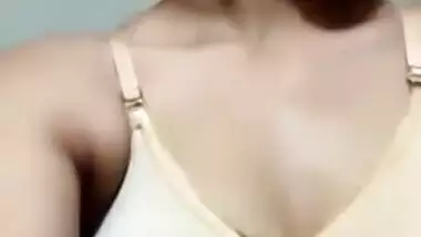 Indian slut takes clothes off but leaves XXX bra on hiding her boobies