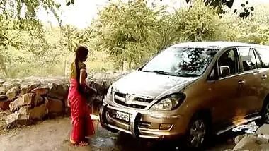 Indian bhabhi outdoor car wash & displaying deep cleavage
