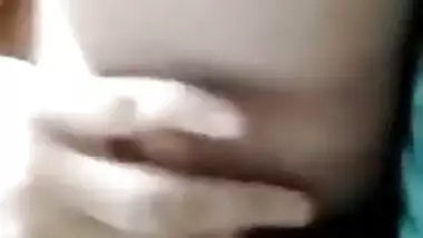 Indian teen turns on touching tits and shoves fingers into pussy