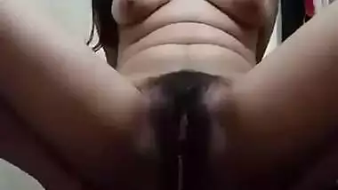 Naughty Indian girl pissing hard on cam