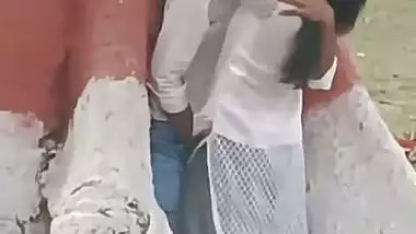 College couple enjoys outdoor sex below a big tree