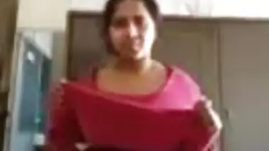 Indian Milf showing her boobs and undressing