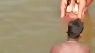 XXX video of Desi girl who flirts with a bunch of guys in a river
