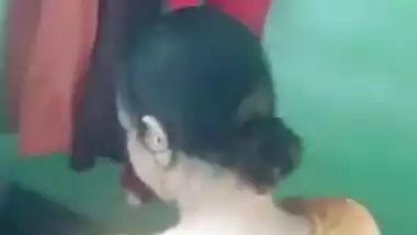 Female wears a yellow Indian sari after flashing her charms in voyeur porn video