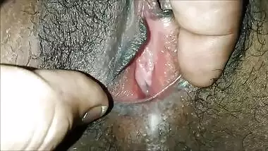 Indian girl has XXX fun spreading pussy lips to demonstrate cum
