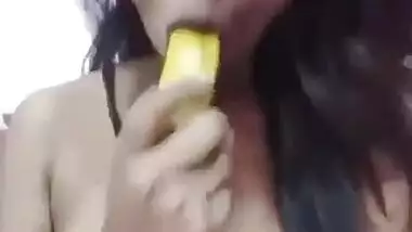 Shaggy boobed Desi bitch teasing with banana