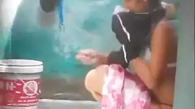 Hidden Cam Showing Desi Girl Bathing In Open