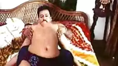 Tamil sex movie showing a busty bhabhi in action
