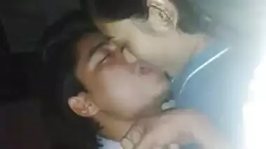 Sleeping Desi babe tries to cover face while sex partner kisses XXX lips