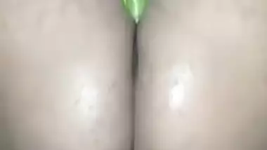 Horny girl using cucumber to masturbate, but it doesn’t fit