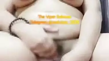 Chubby Desi model with big tits sticks sex toy into her XXX slit