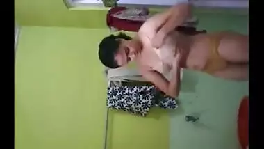 Naked sister showing off while bathing