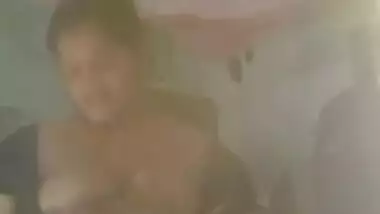 Middle-aged whore of India gladly takes her XXX tits out of clothes