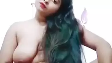 Long-haired Desi camgirl with big XXX melons masturbates pussy