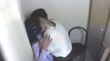 Indian girl having fun with her boyfriend in Internet cafe