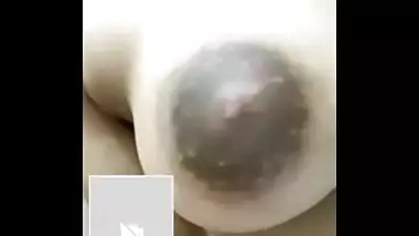 Indian girl doesn't hide boobs from camera while changing clothes