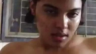 Indian teen squeezes her XXX titties showing them off on camera