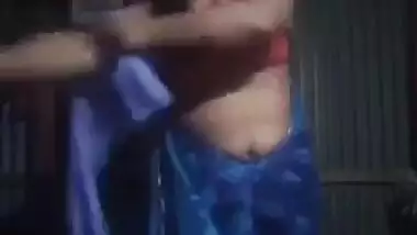 Desi bhabhi stripping saree and showing boobs