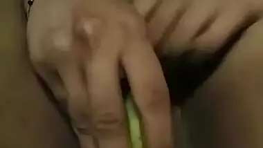 Dick-hungry Indian girl dildoing pussy with banana