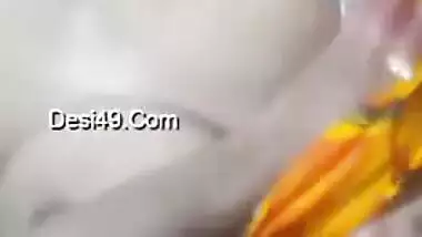 Kissable young woman pulls sari up and leaks natural tits in sex video