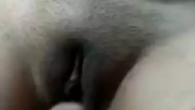 Horny Desi man enjoys and XXX records his wife's pussy fingering