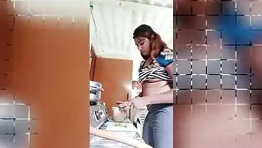 Chubby Desi gal while cooking can barely hide her perky XXX boobs
