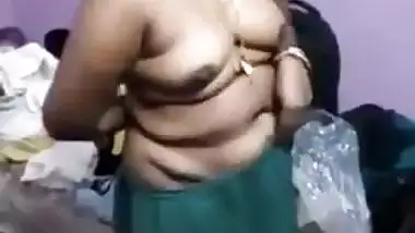 very shy indian aunty stripping infront of...