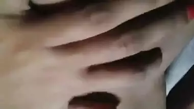 Indian girl lies on her back and exposes XXX parts spreading sex labia