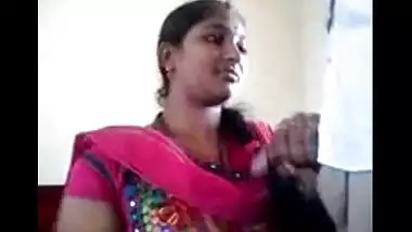 South Indian college girl with her teacher in class room