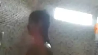 Indian girl takes a shower but she isn't going to interrupt video call