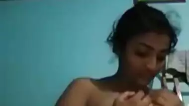 Indian love allows her sex fans to see these XXX melons under a fan